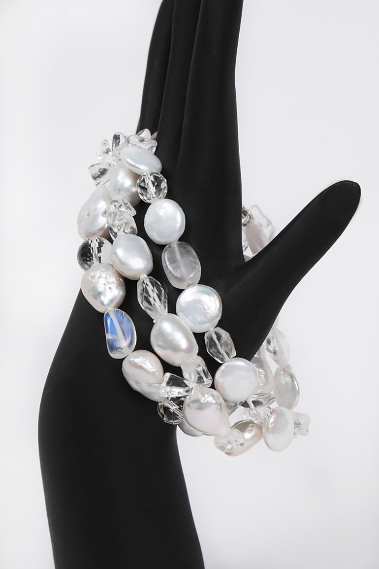Charming: A Three Strand Bracelet of Freshwater Pearls and Faceted Clear Crystals
