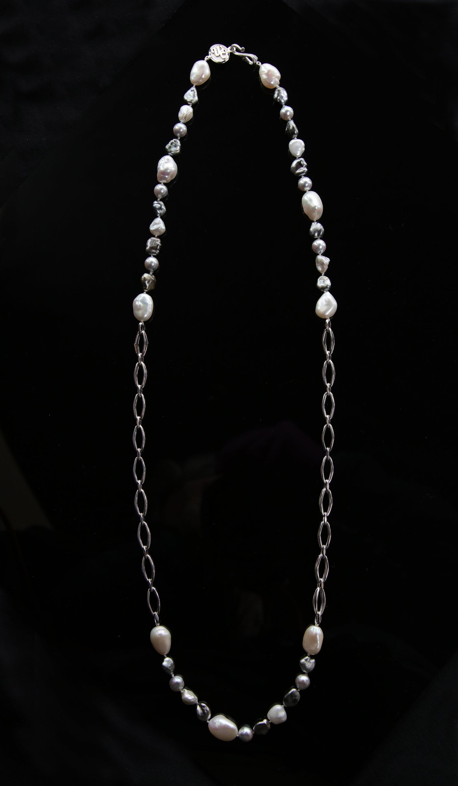 14kt heavy, Italian white gold chain. Gems: akoya and keshi pearl. White Orchid Studio logo clasp. Approximate length 34."