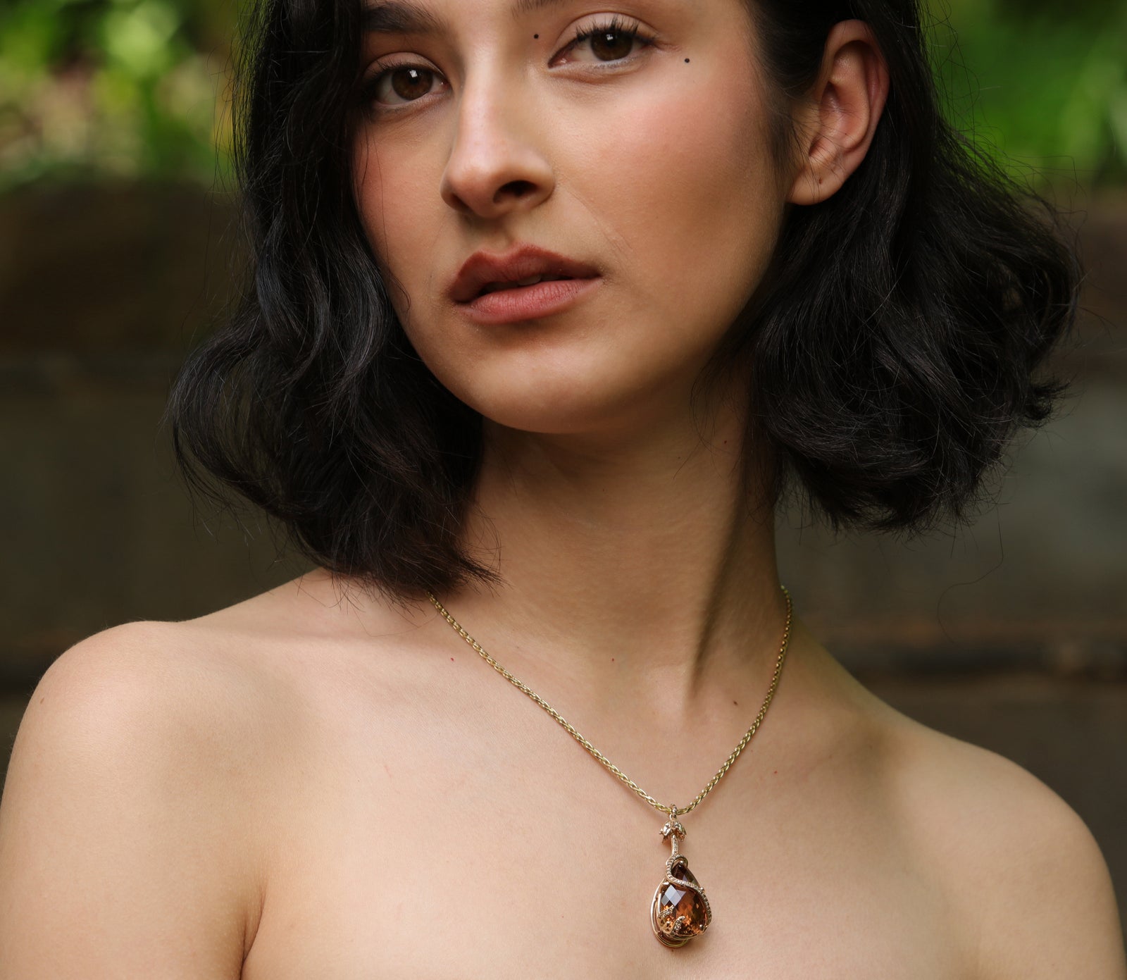 Soothing Sunset: A Precious Topaz, Diamond, and Gold Pendant