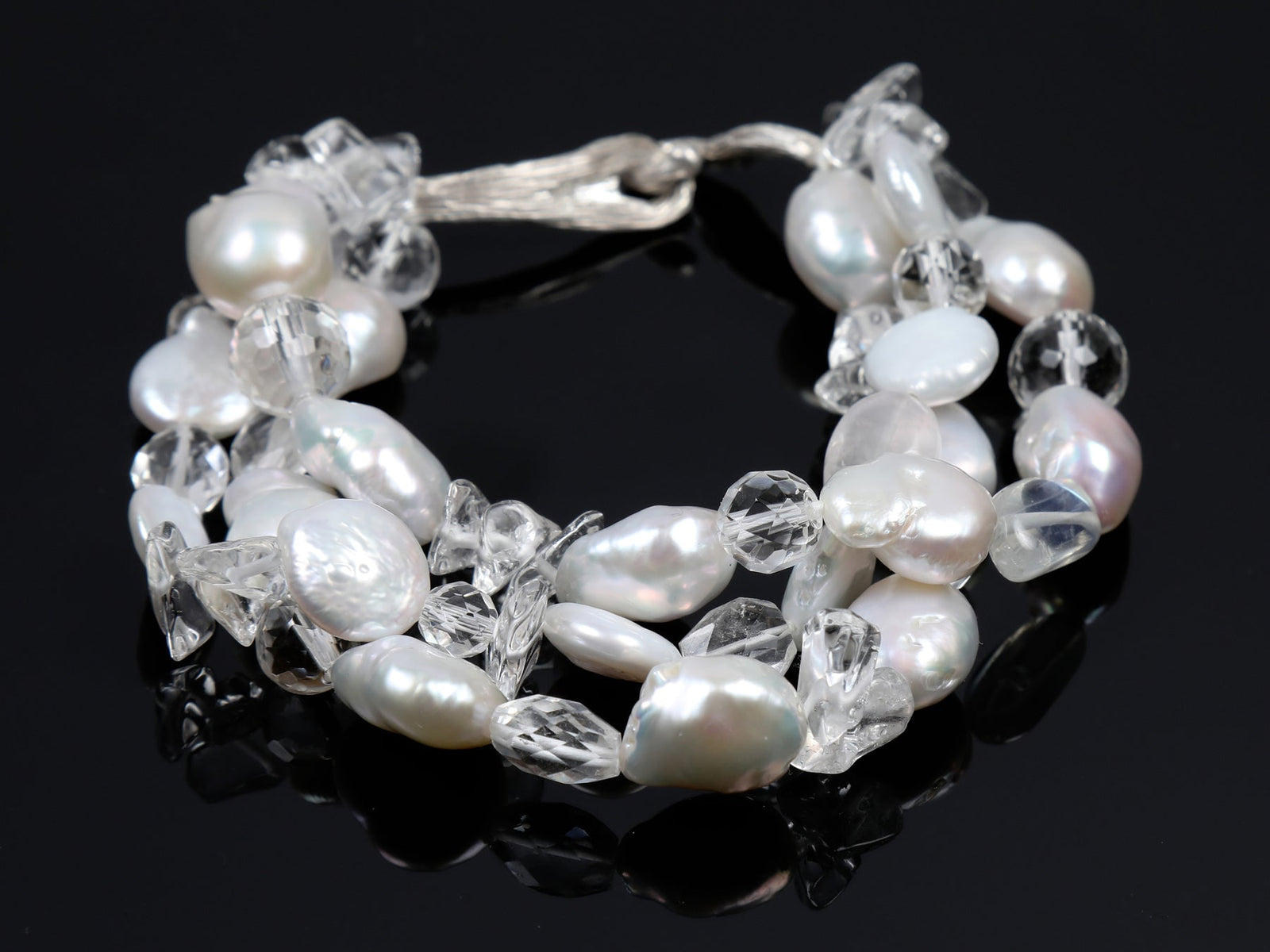 Charming: A Three Strand Bracelet of Freshwater Pearls and Faceted Clear Crystals