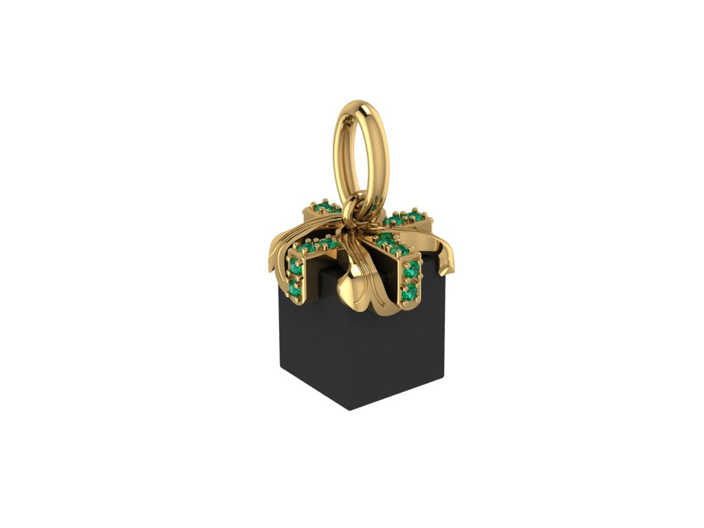 For Love: Charm of Gold and Diamonds Wrapped Around a Polished, Black Spinel Gift Box