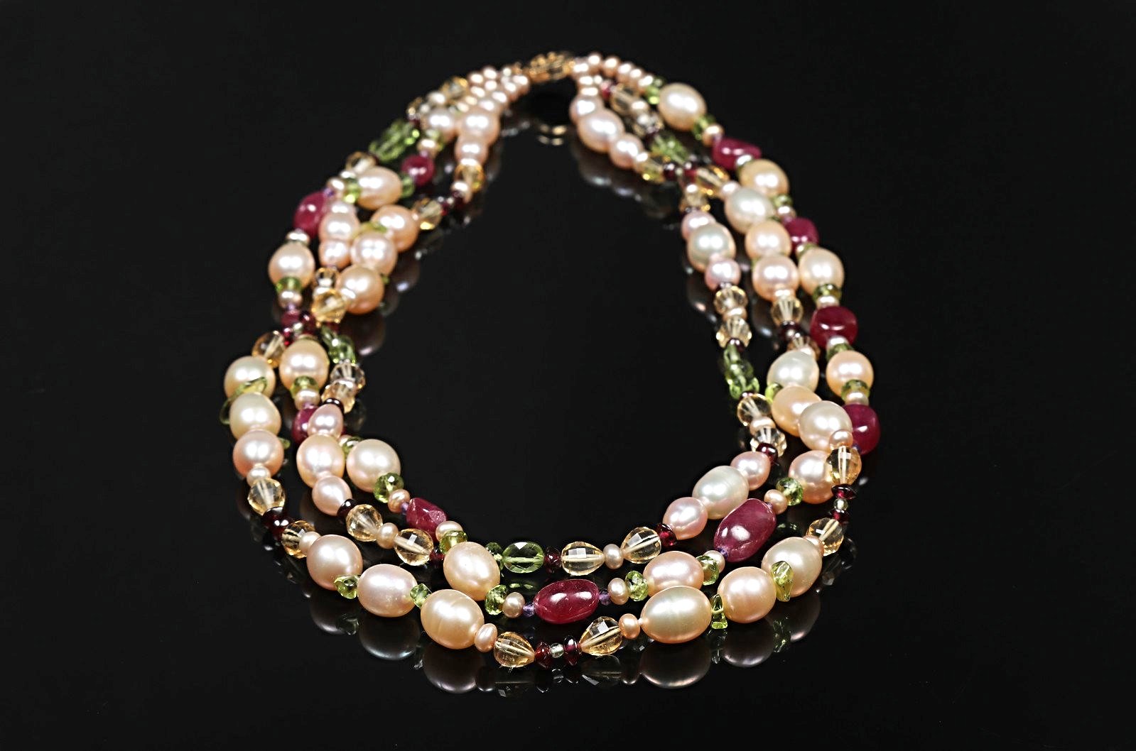 14kt yellow gold 3-strand necklace. Gems: pearls, rubies, garnet, citrine, peridot, and amethyst. A celebration of Stewart tartans. WOS monogram clasp.