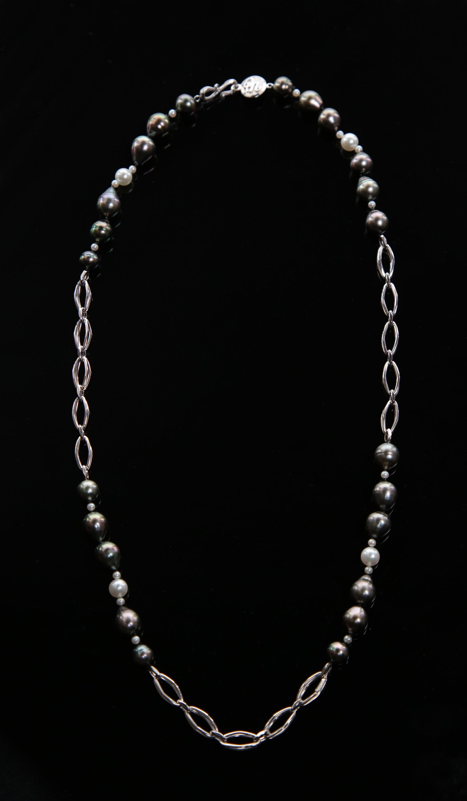 14kt heavy, white gold chain.  Gems: Tahitian and akoya pearl.  White Orchid Studio logo clasp.  Approximate length 26."
