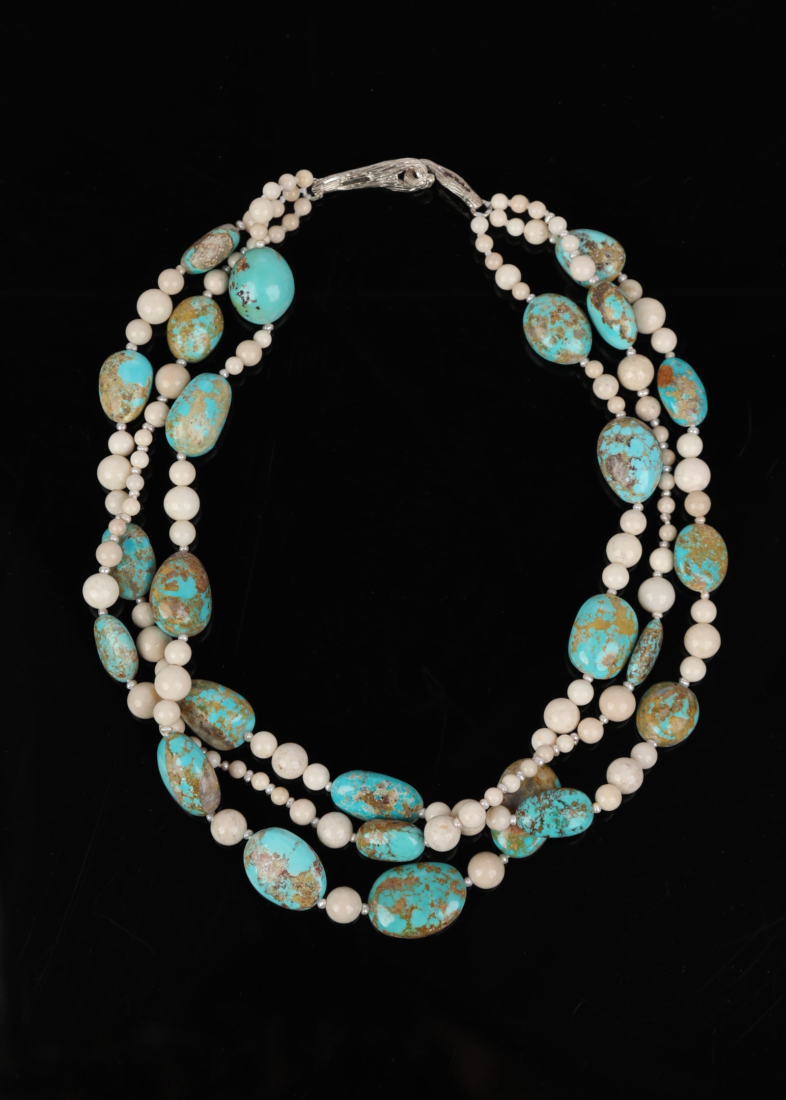 14kt. white gold. Gems: Peruvian opals, river stone jasper, freshwater pearls, and whiskey quartz. Approximate length is 18.”