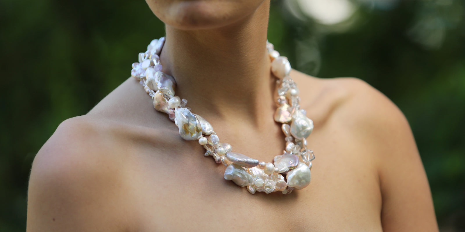 Charming: A Three Strand Necklace of Freshwater Pearls and Faceted Clear Crystals
