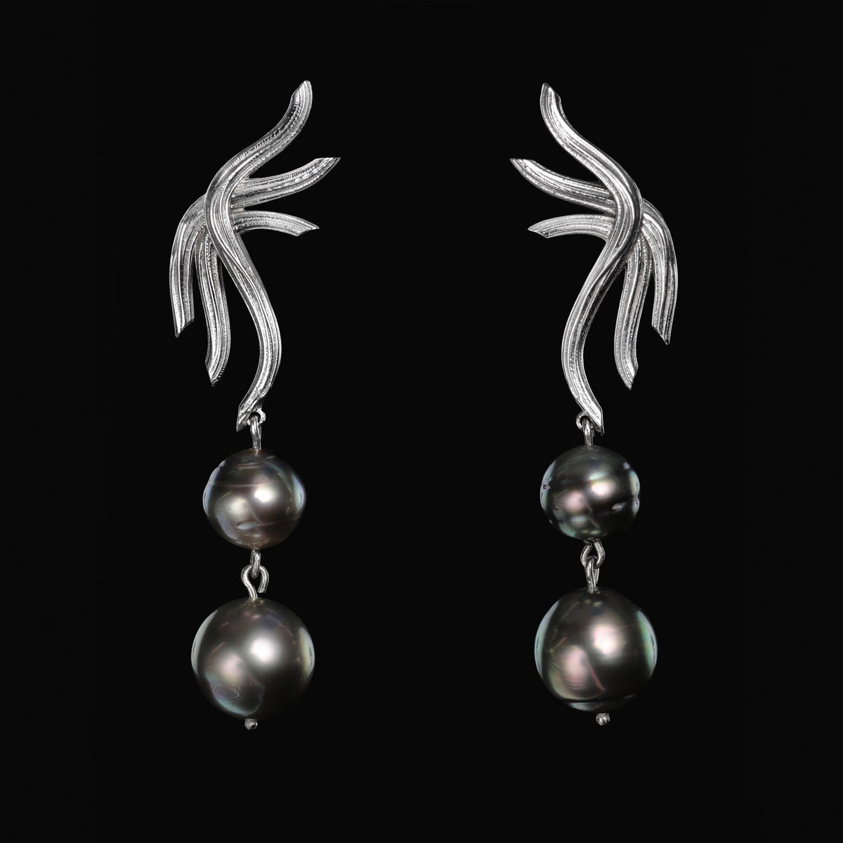 Ethereal: White Gold Earring Embellished With Black Tahitian Pearls