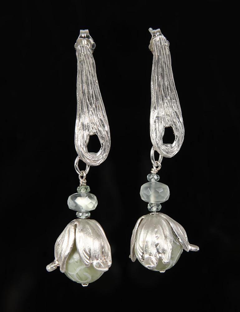 Sterling silver:  Gems: carved jade, Ceylon moonstone, and Champagne zircon. White Orchid Studio vanilla bean earring and bead caps.  Approximate length 3.”