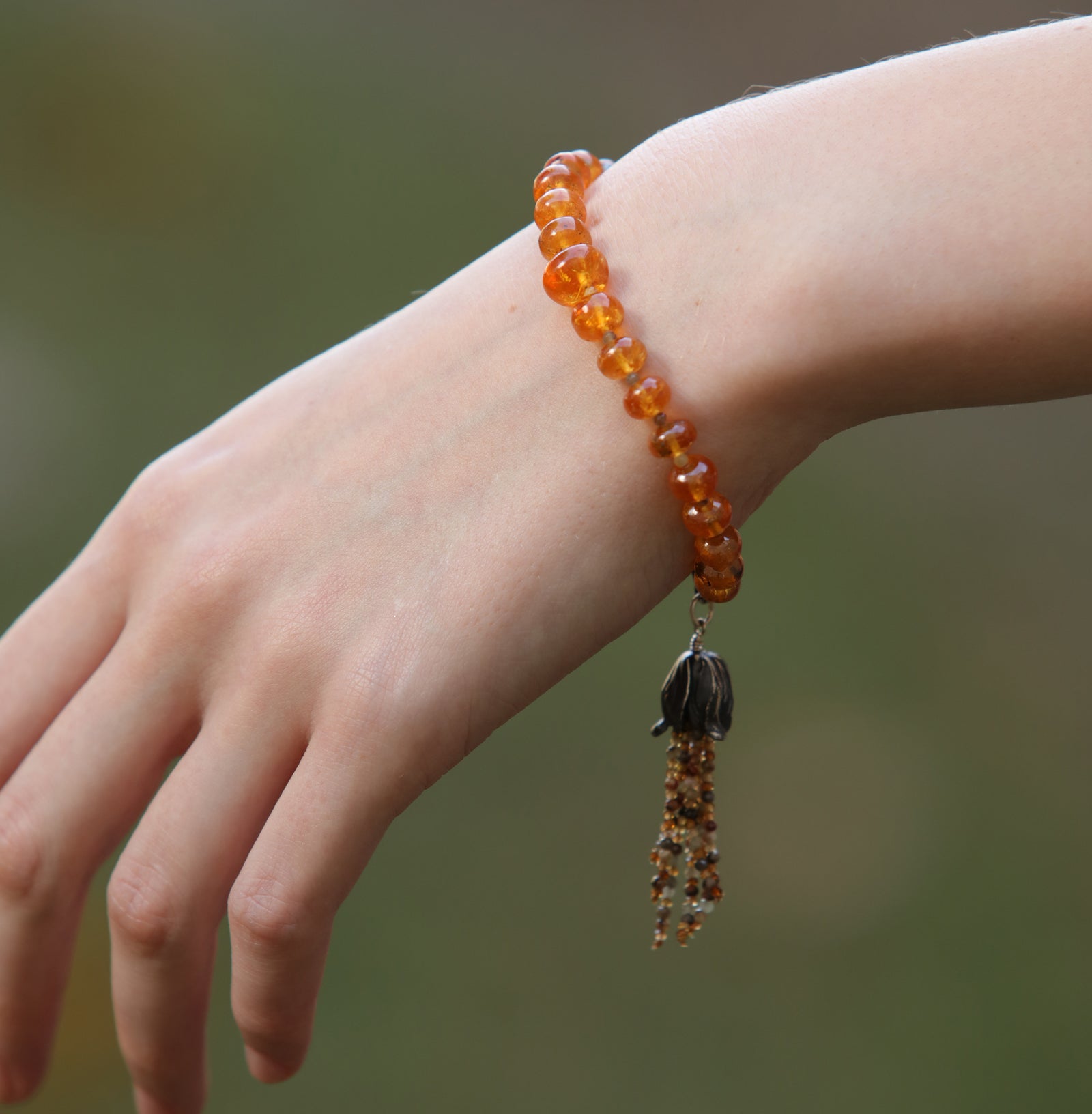Sunset in the Desert: Mandarin Garnet, Orange Sapphire, and Silver Bracelet