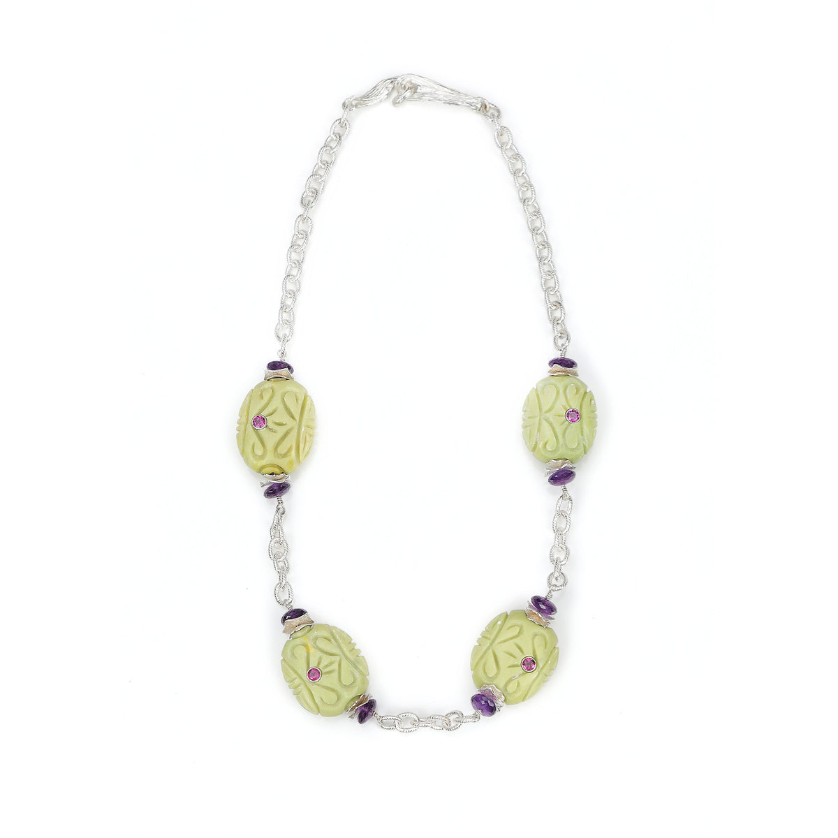 Sterling silver: textured silver chain. Gems: Mojave turquoise, Malaya and almandine garnet, and amethyst. White Orchid Studio’s vanilla bean clasp and wave spacers. Approximate length: 19.5”